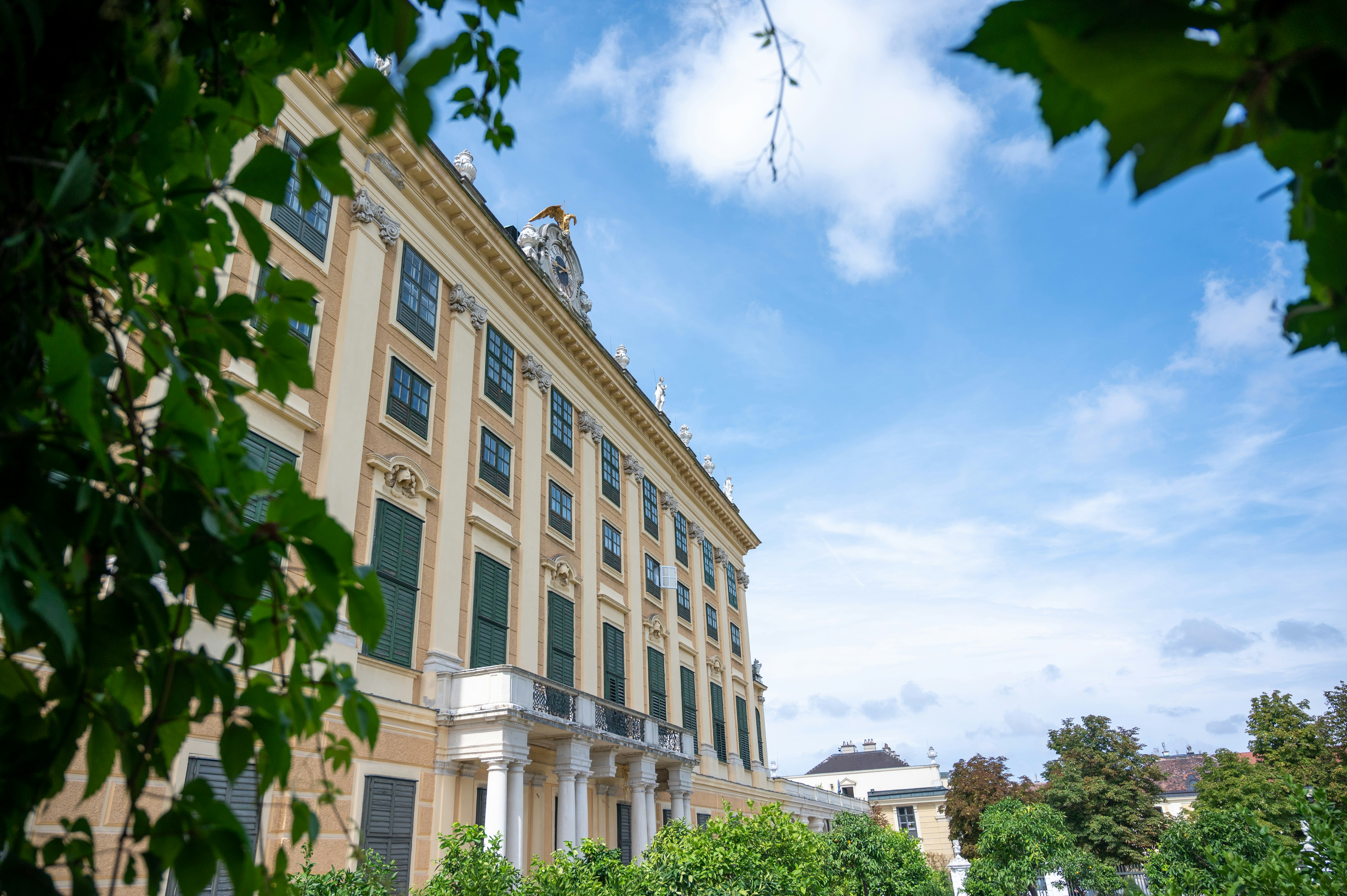 a building with columns and a balcony, 