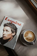 a book and a cup of coffee