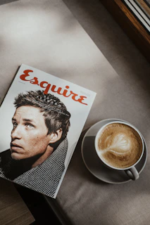 a book and a cup of coffee