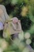 a person holding a purse