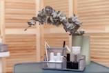 Pedicure tools arranged neatly on a wooden table.