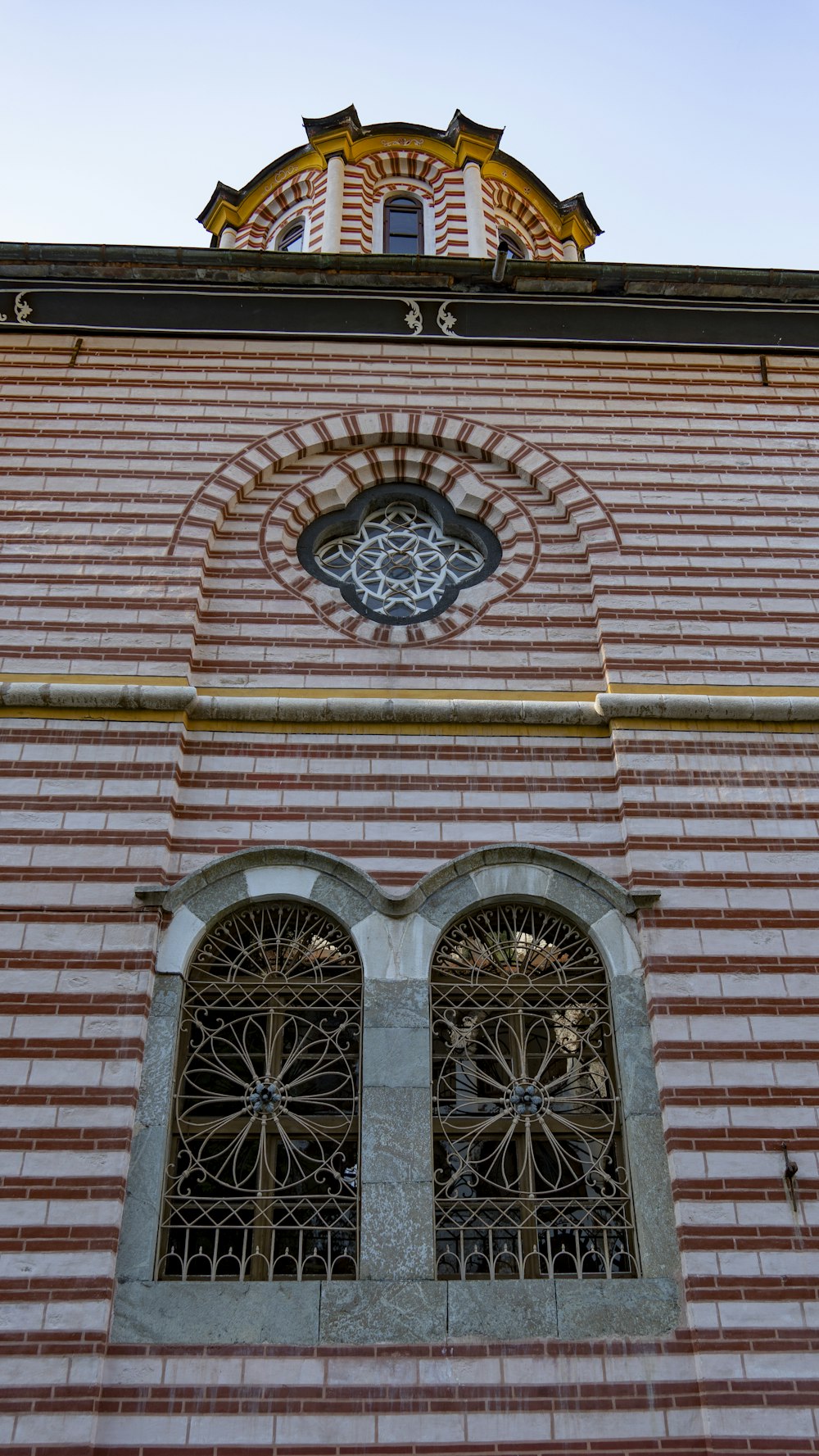 a brick building with a clock
