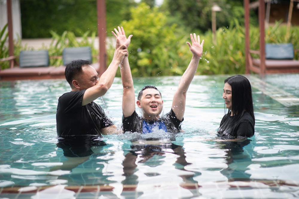 a group of people in a pool