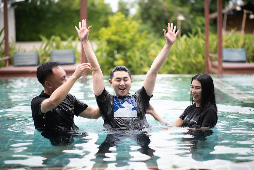 a group of people in a pool