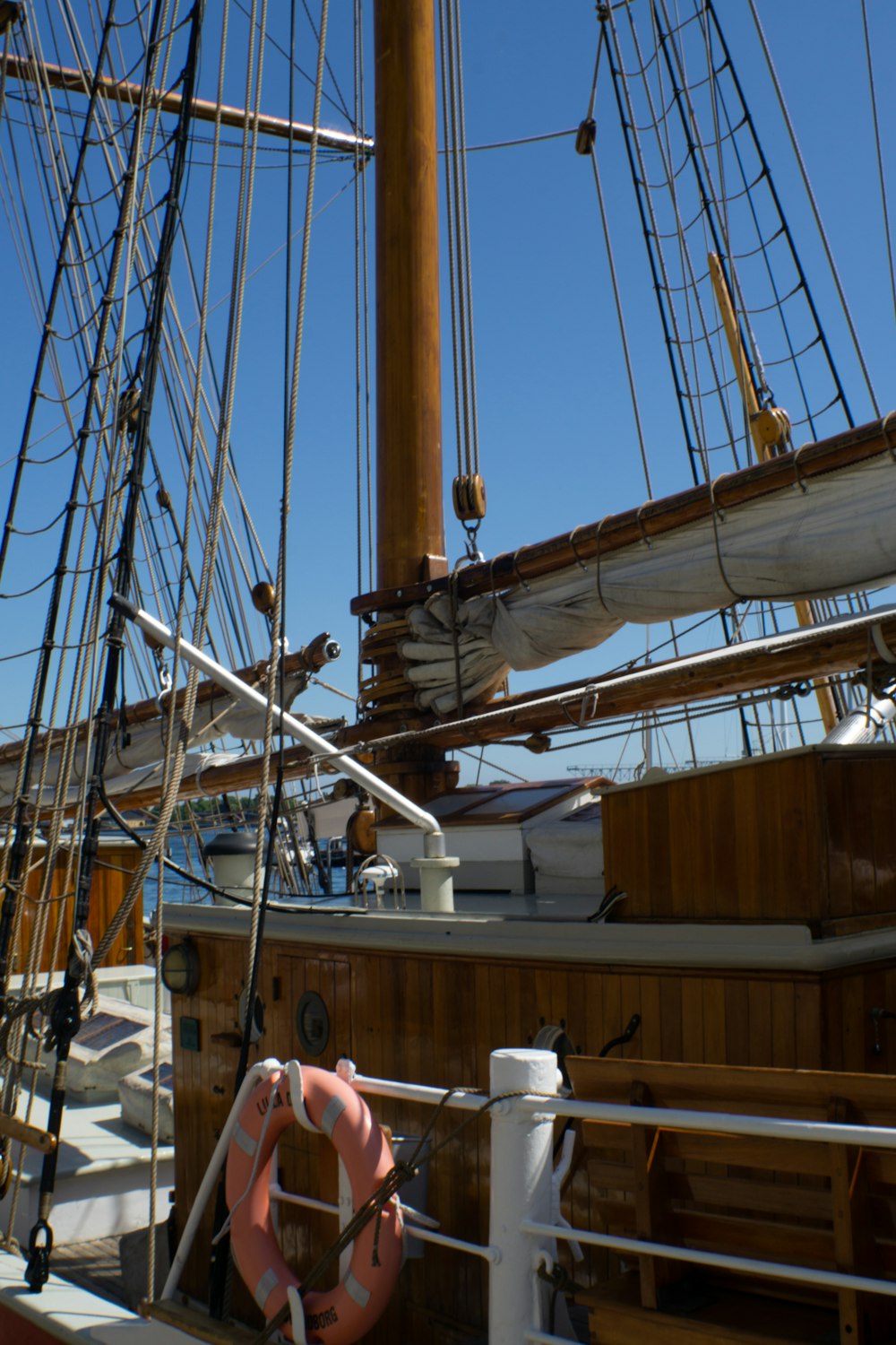a large sailboat with ropes