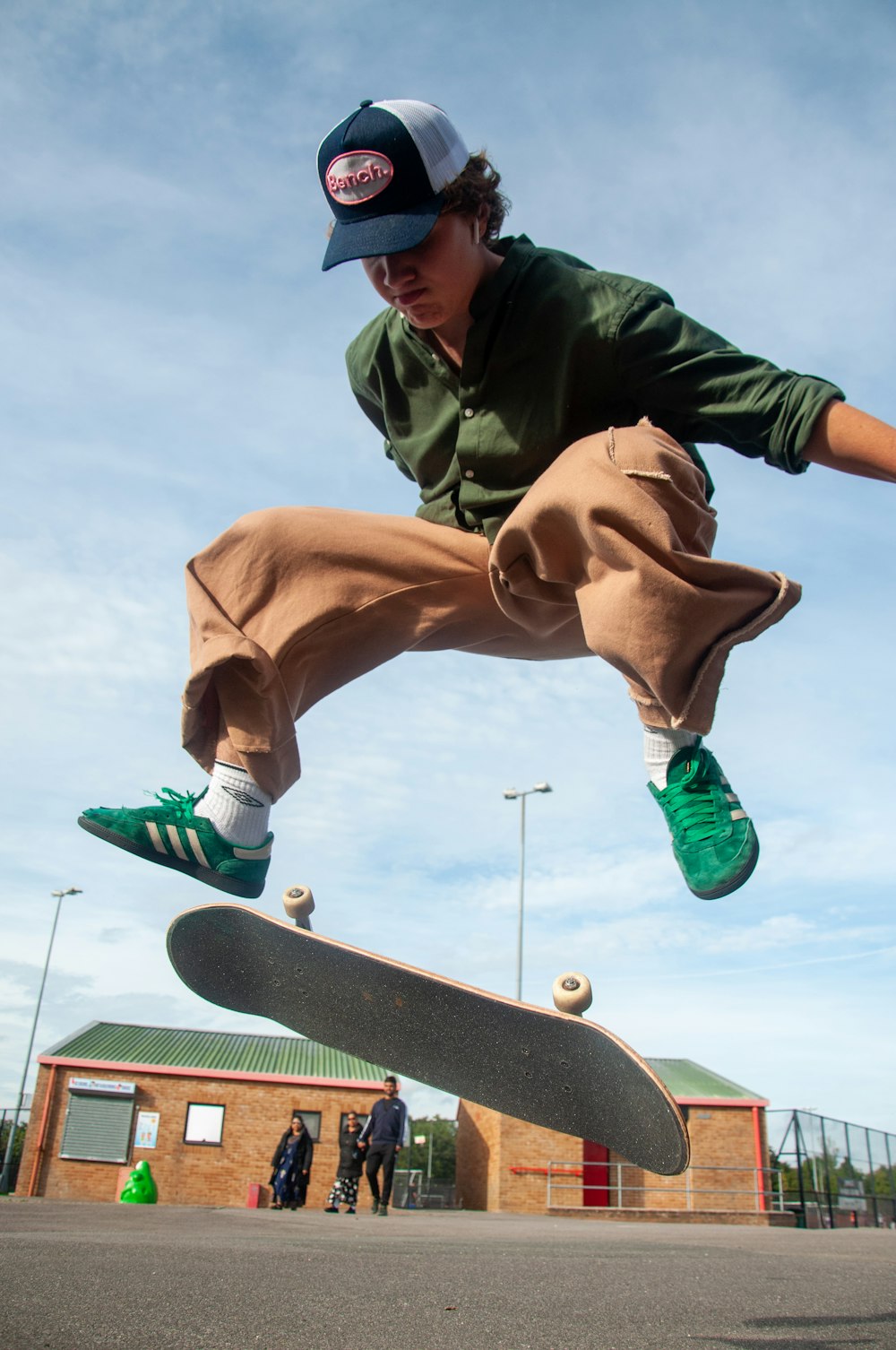 a man doing a trick on a skateboard