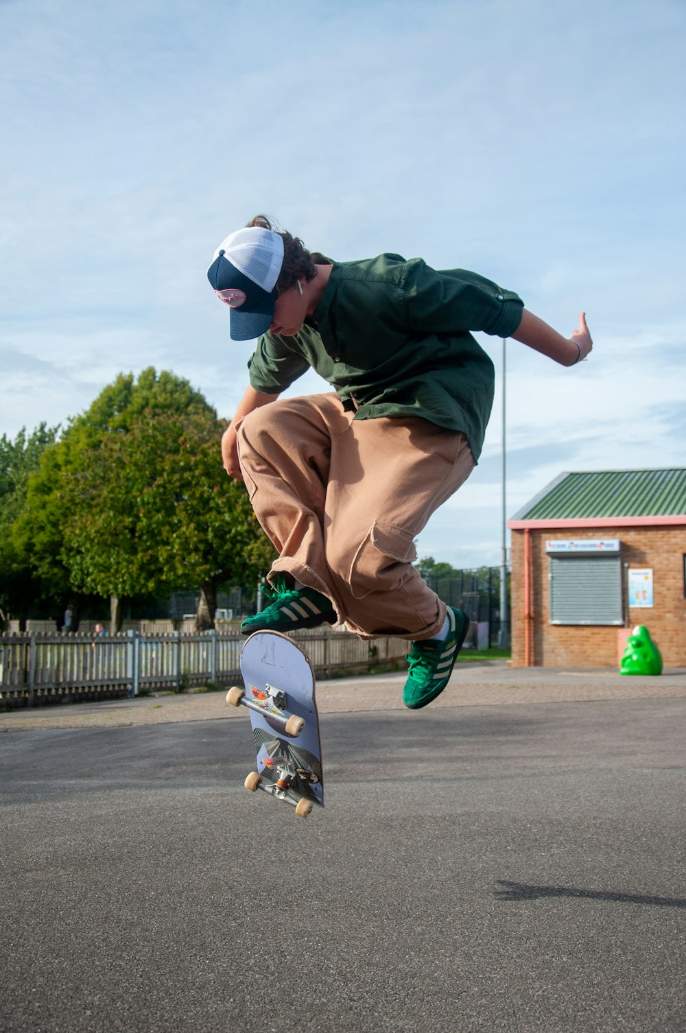 a man doing a trick on a skateboard