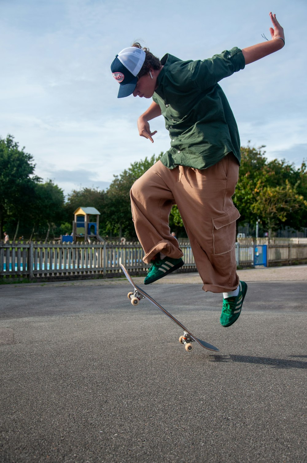 a man doing a trick on a skateboard