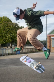 Skateboarder wearing Trust Skateboard apparel performing a trick.