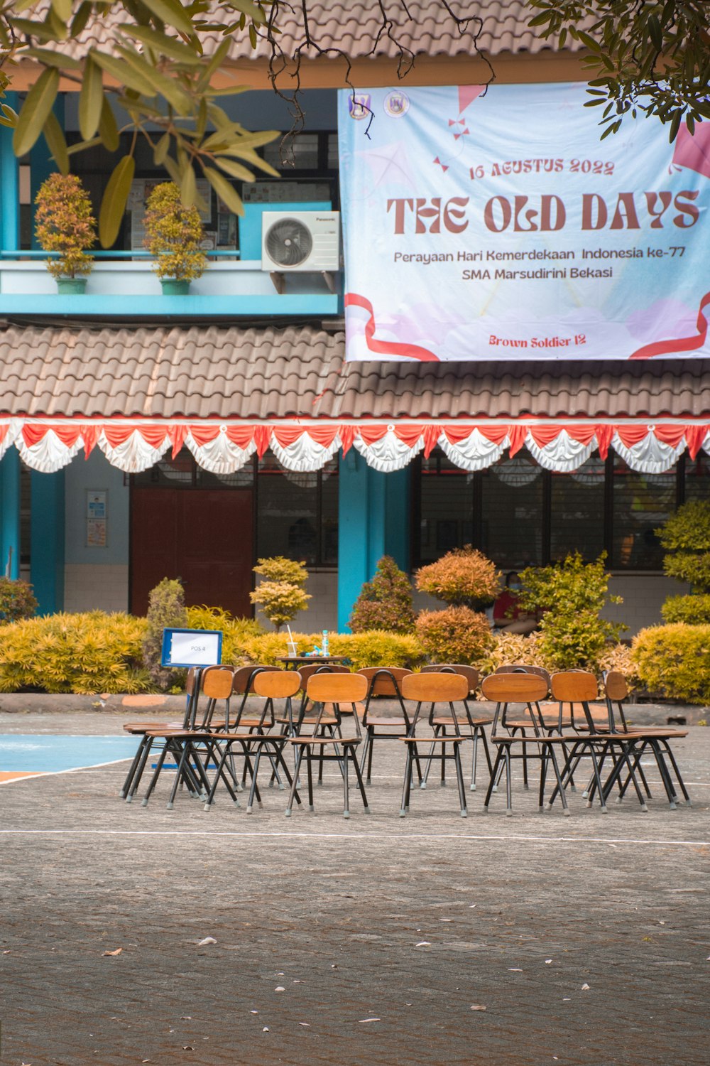 a restaurant with chairs outside