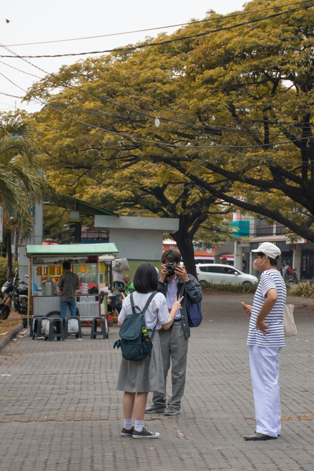 a group of people standing outside