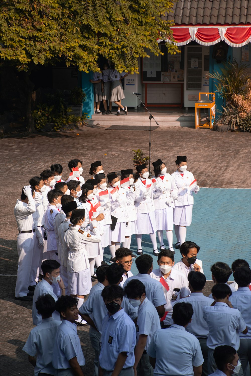 a group of people in white robes