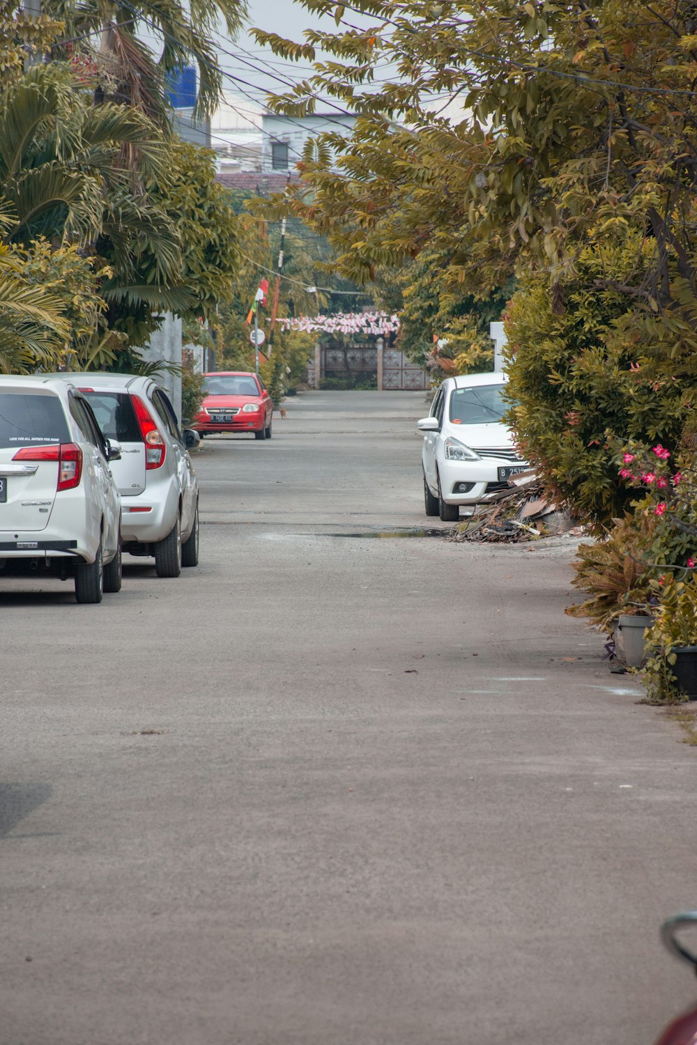 a street with cars parked on the side