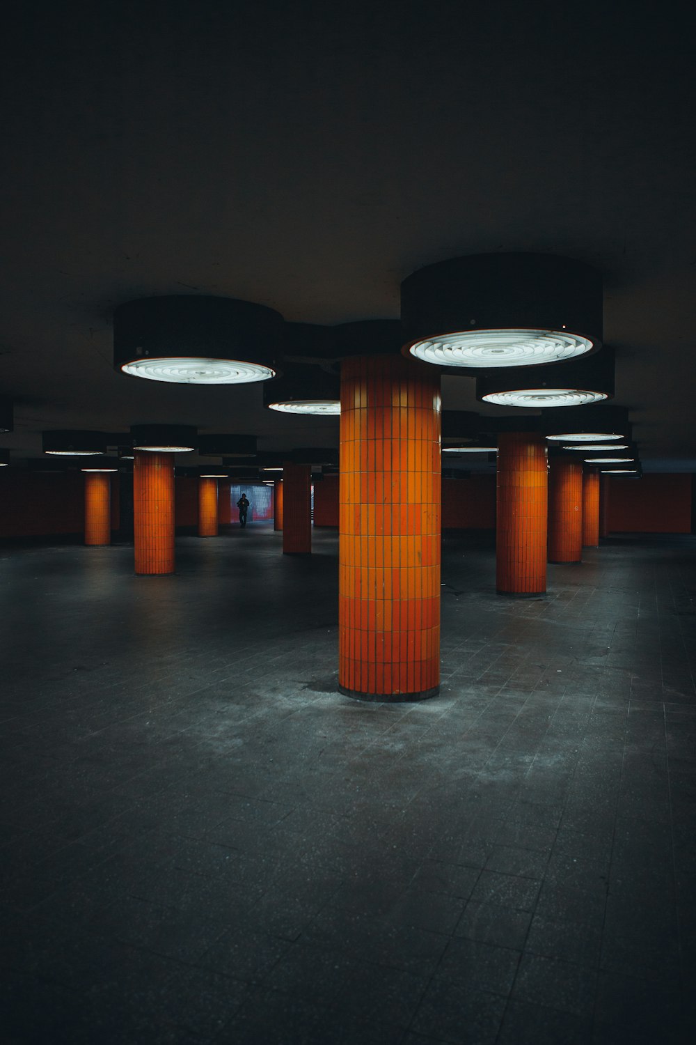 a group of pillars in a dark room
