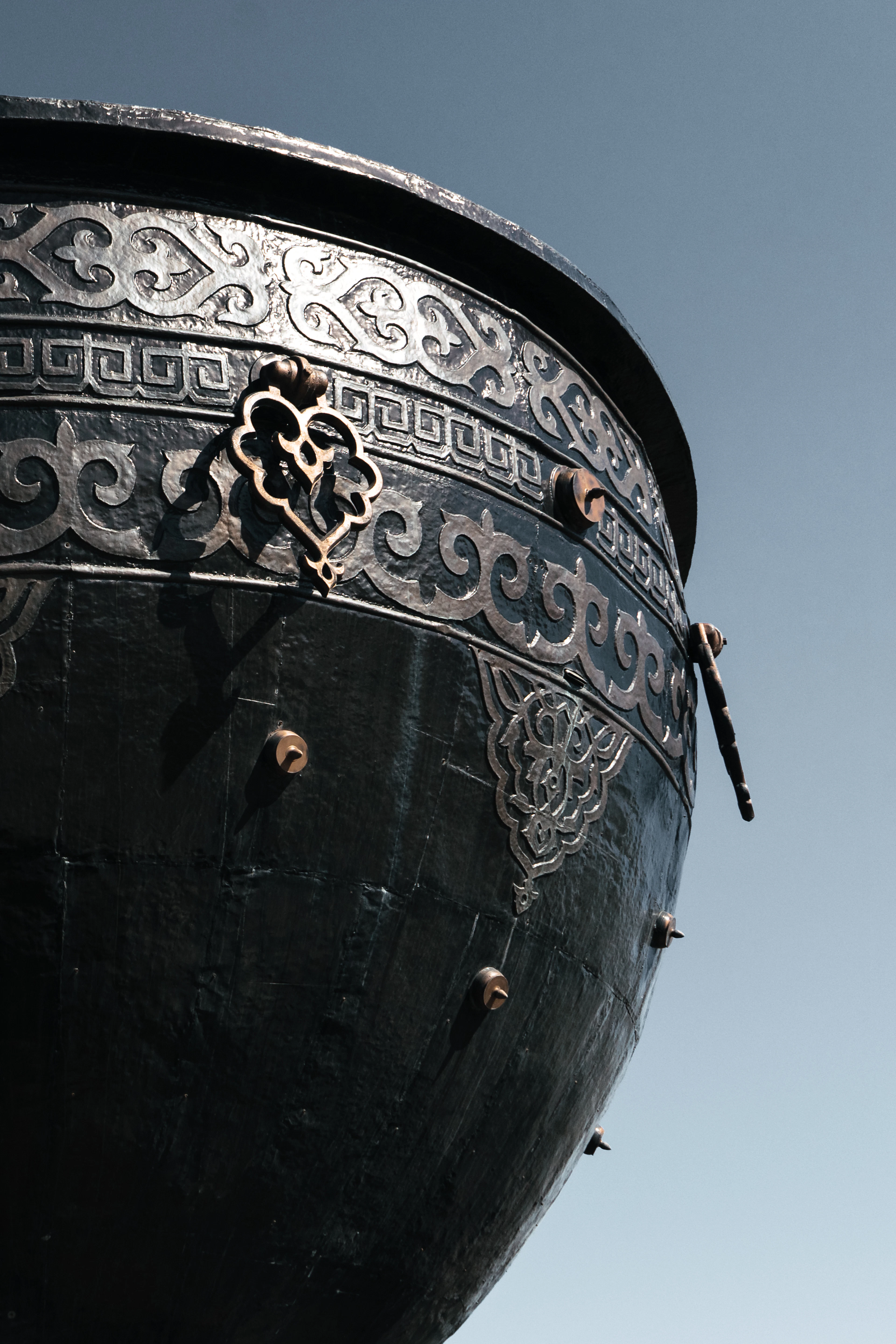 The engraved kazan a cook makes plov in, Samarkand