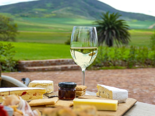 a glass of wine on a table