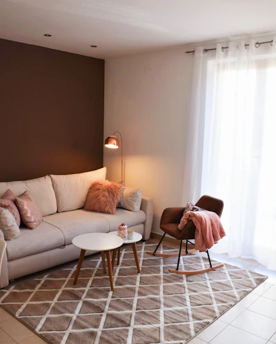 a living room with a couch and a table