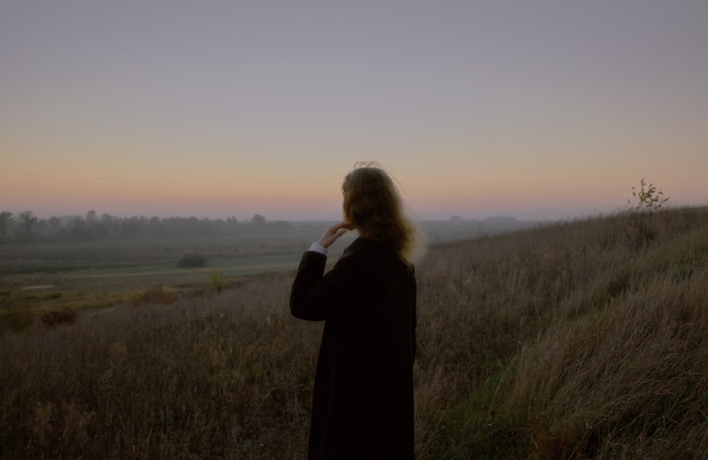 a man standing in a field