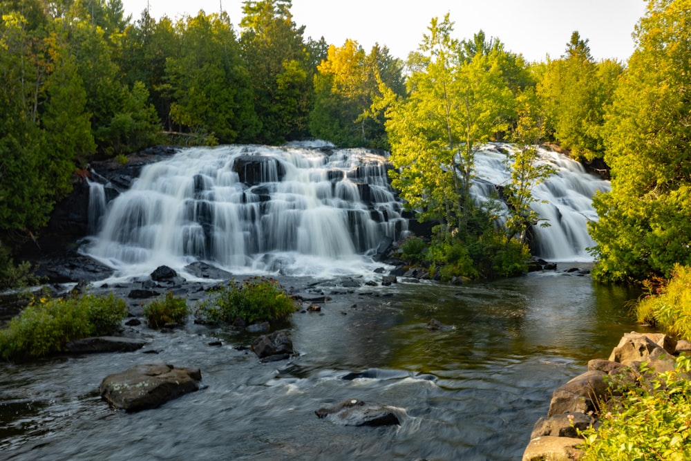 a waterfall in a forest