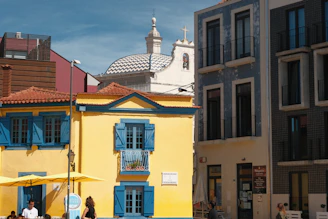 a group of buildings with a domed roof