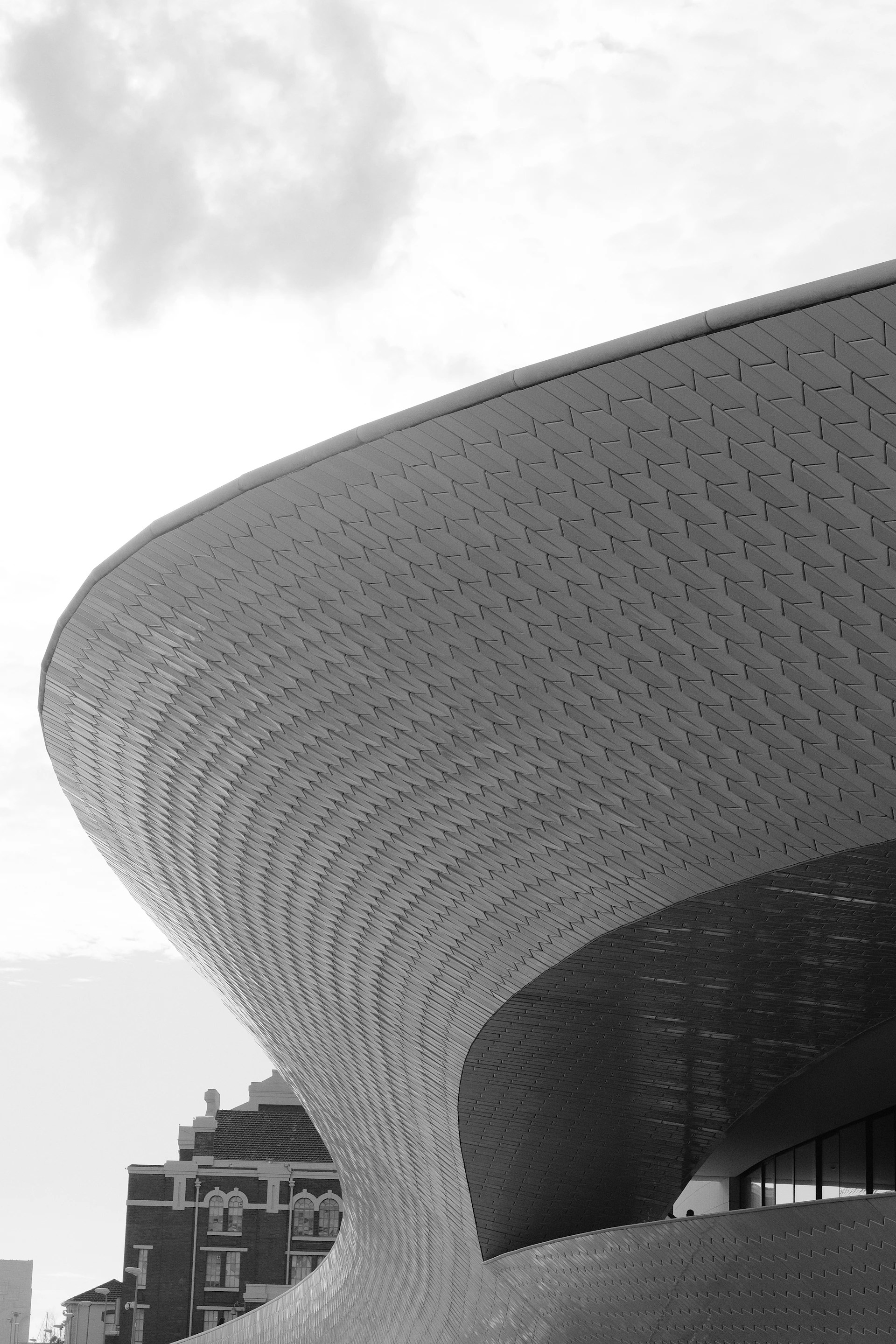 a building with a curved roof
