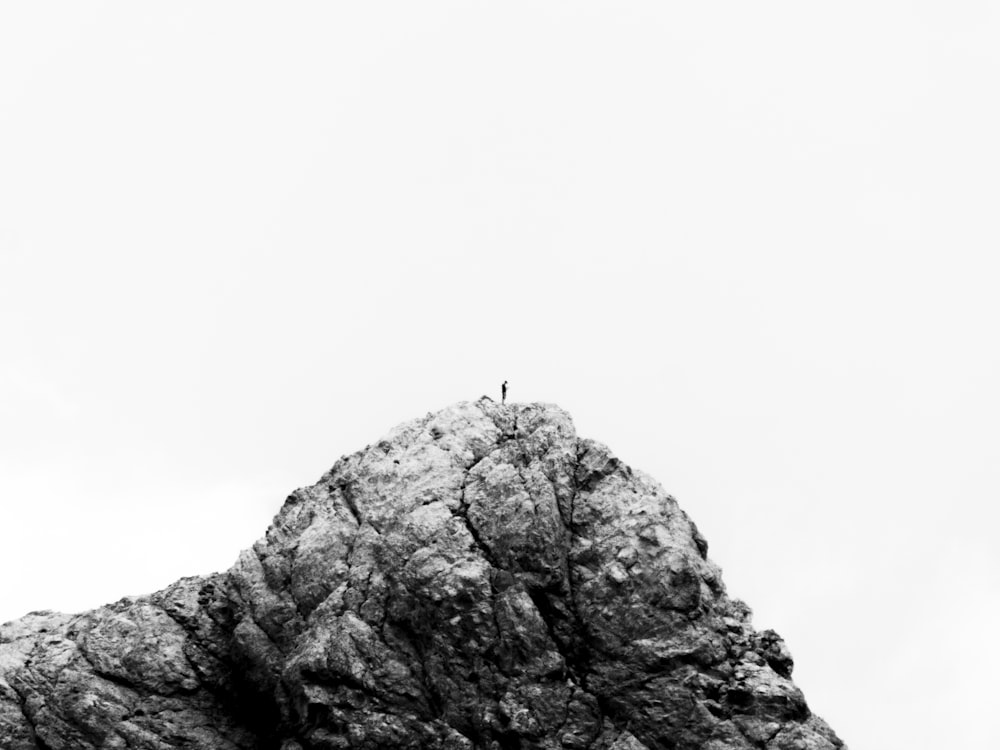 a group of people on top of a mountain