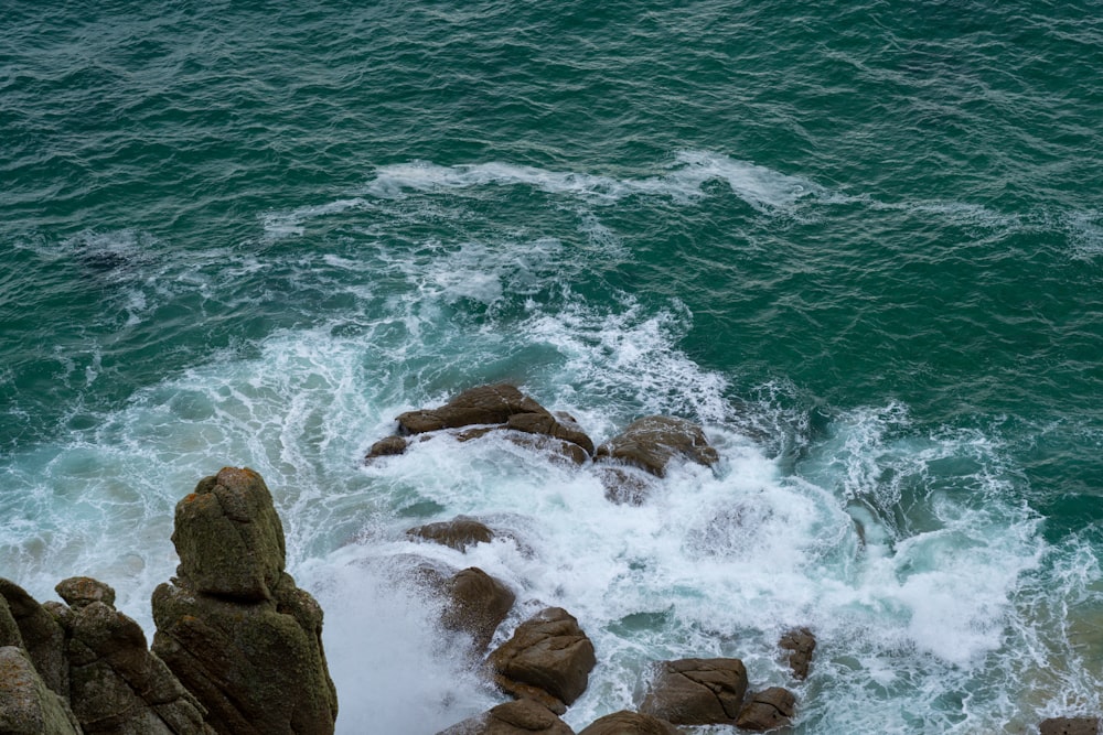 waves crashing on rocks