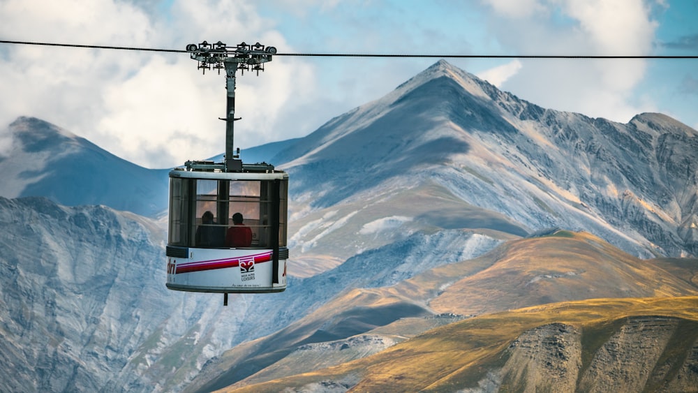 a cable car going up a mountain