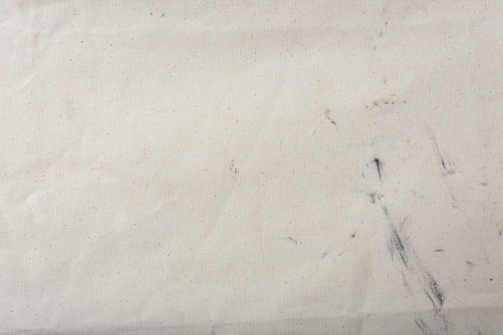 a white surface with black marks