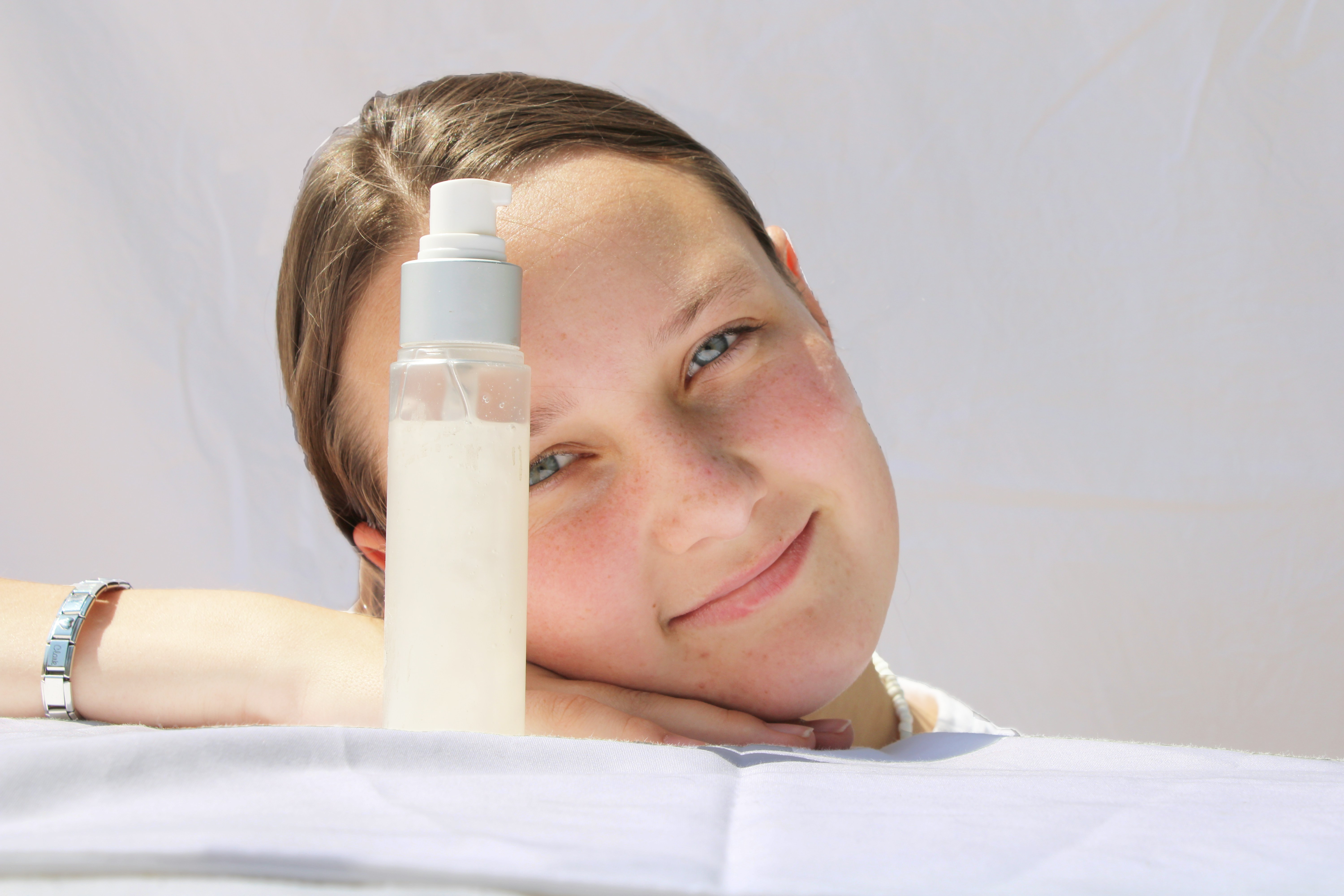 a person with a bottle of water on the head