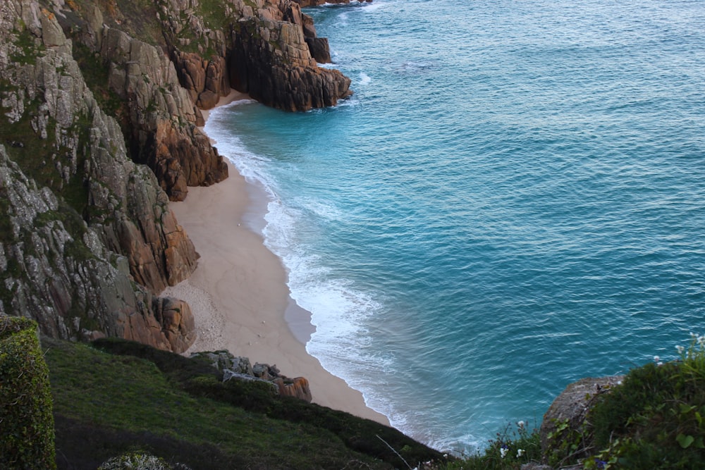 a beach with a body of water