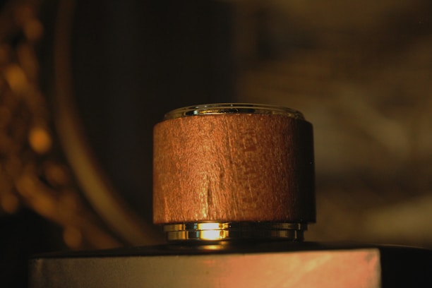 A beautifully crafted wooden item displayed in a well-lit environment.