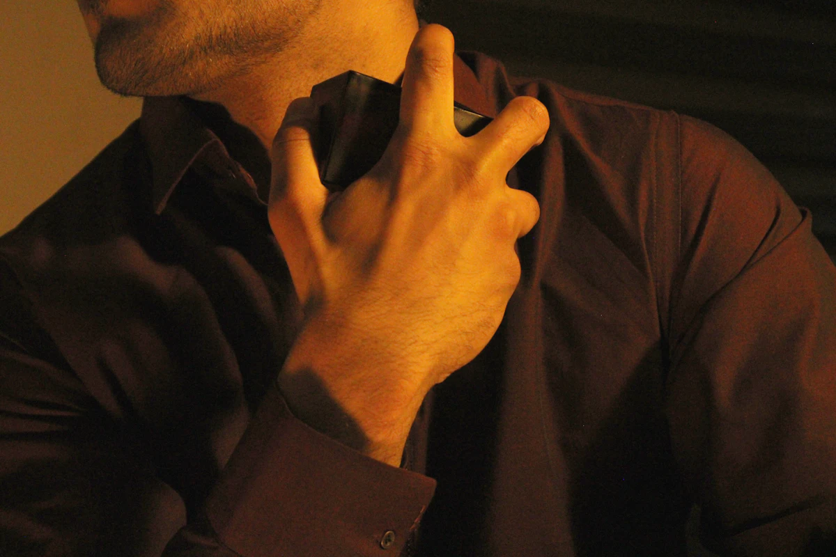 A man clutching his chest in pain