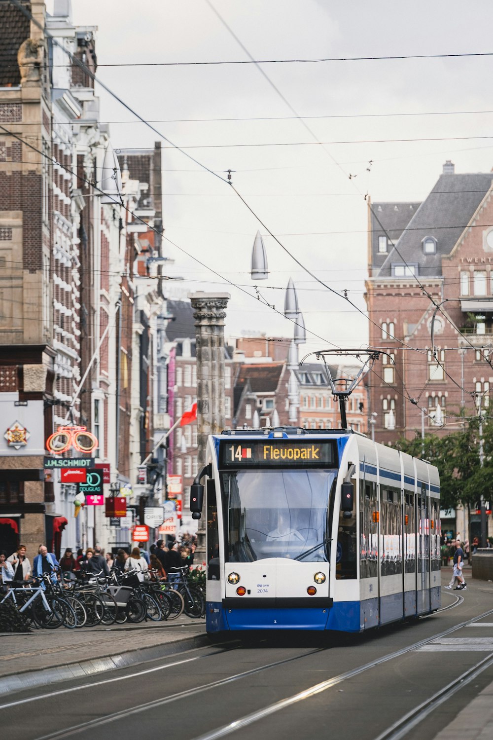 a bus travels down the street