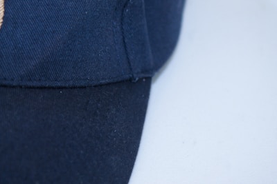 A close-up of a fedora and newsboy cap from our collection.