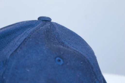 Close-up of a premium Colombian soccer team cap showing detailed stitching and vibrant colors.