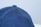Close-up of a sporty cap with detailed stitching, shown with a zoom effect.