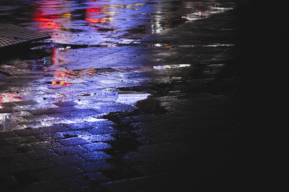 a body of water with a reflection of a person in it