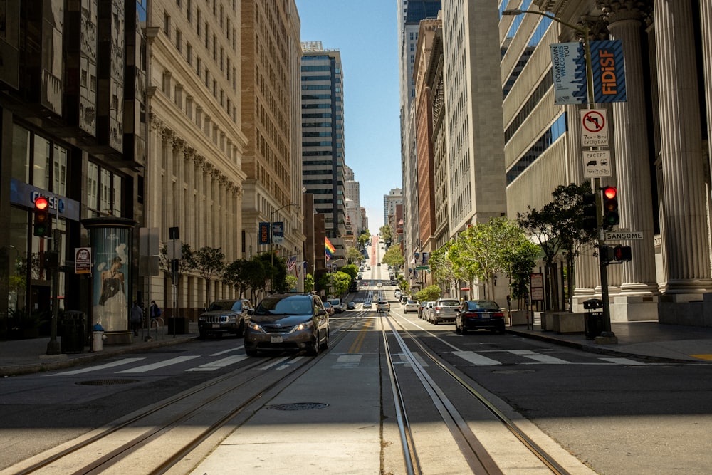 a city street with cars and buildings