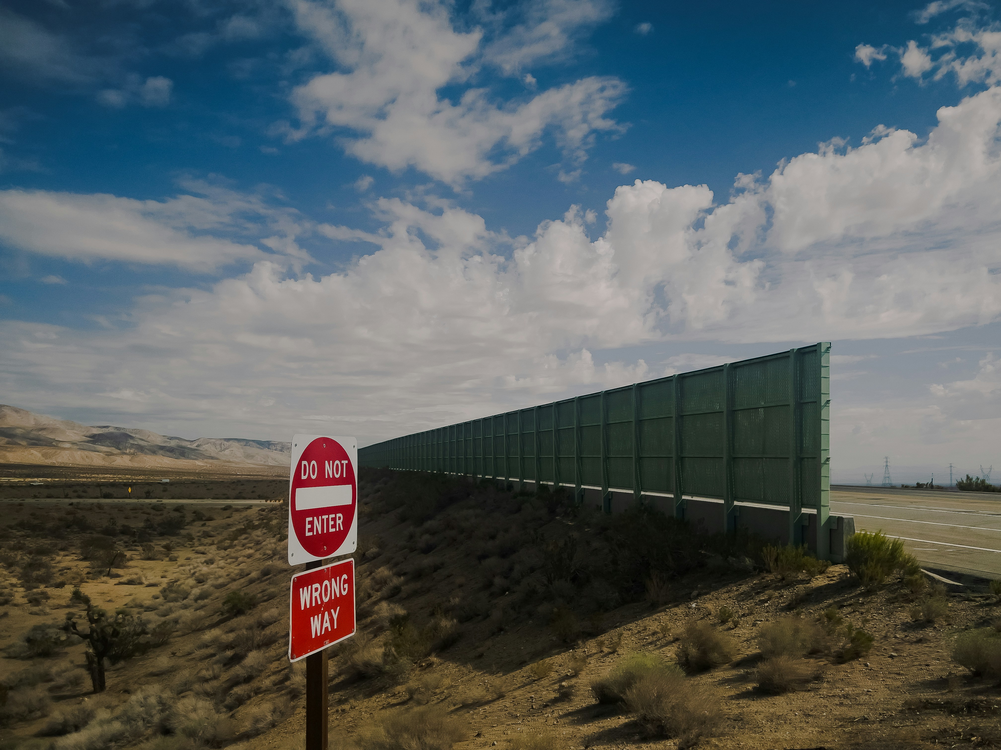 a train going by a sign