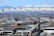 a city with a mountain in the background