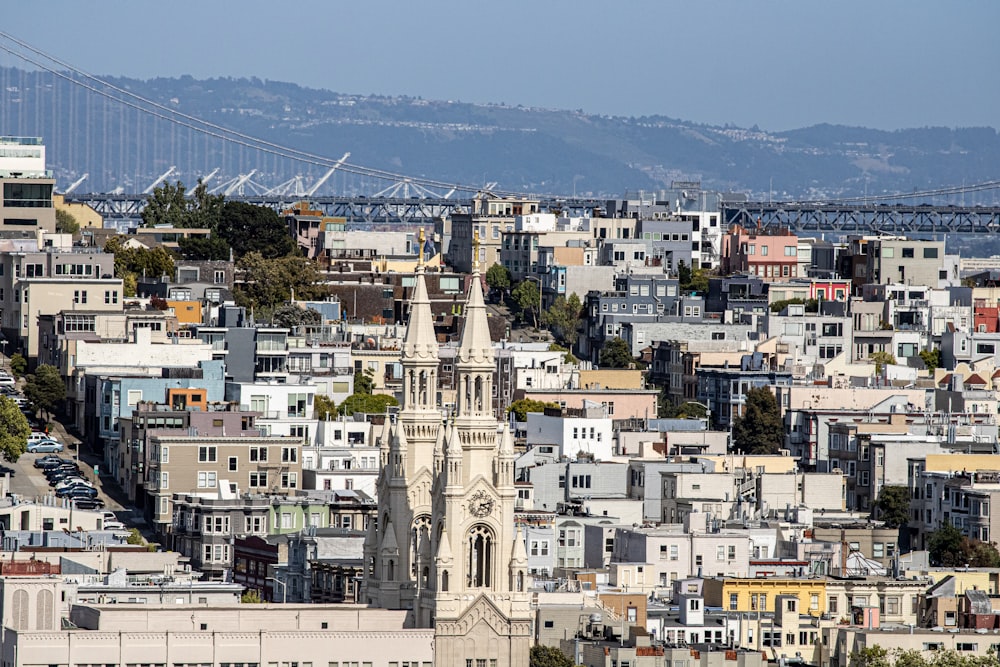 a city with a bridge in the background