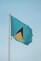 a blue and yellow flag on a flagpole