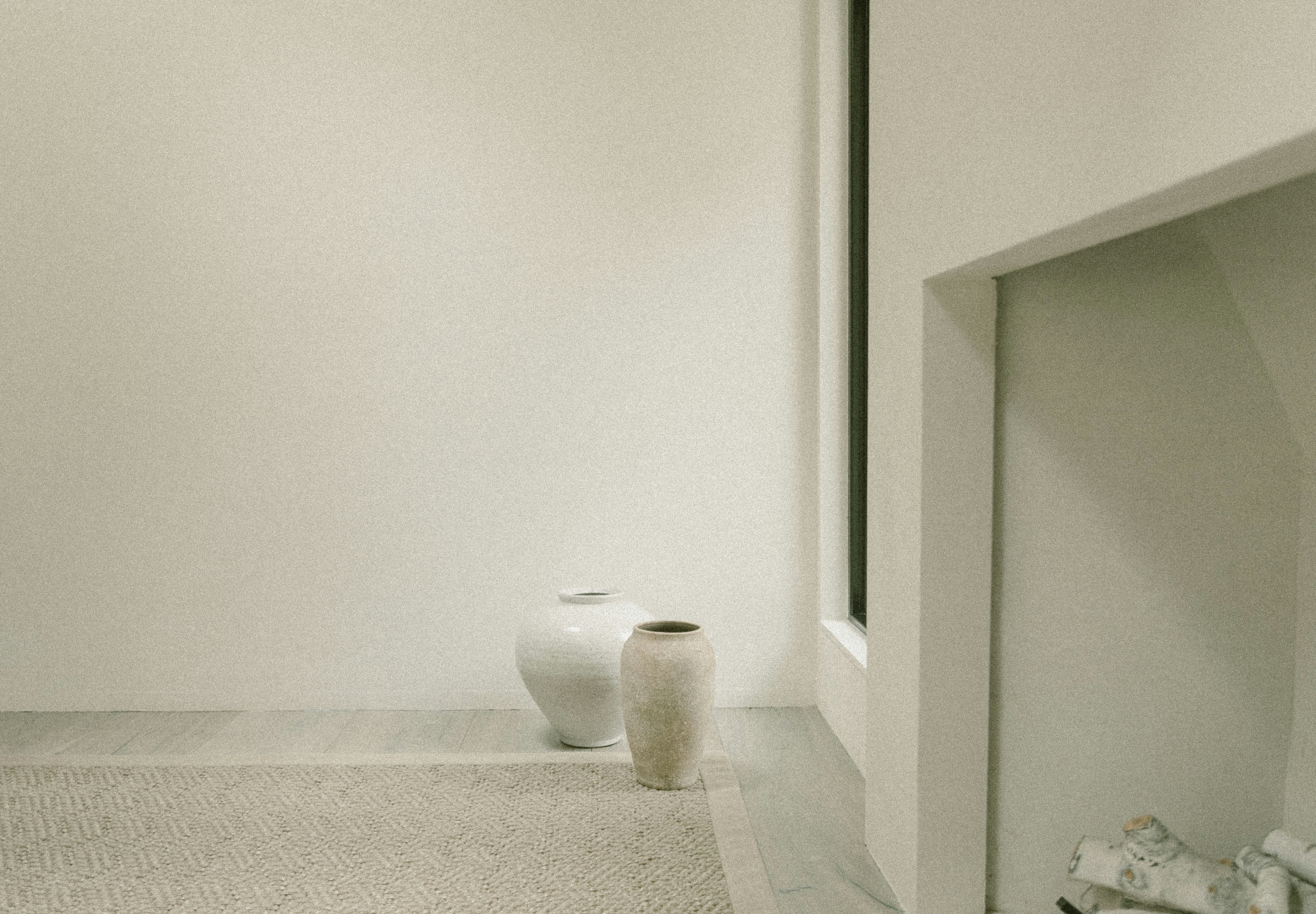 a vase and a vase on a counter