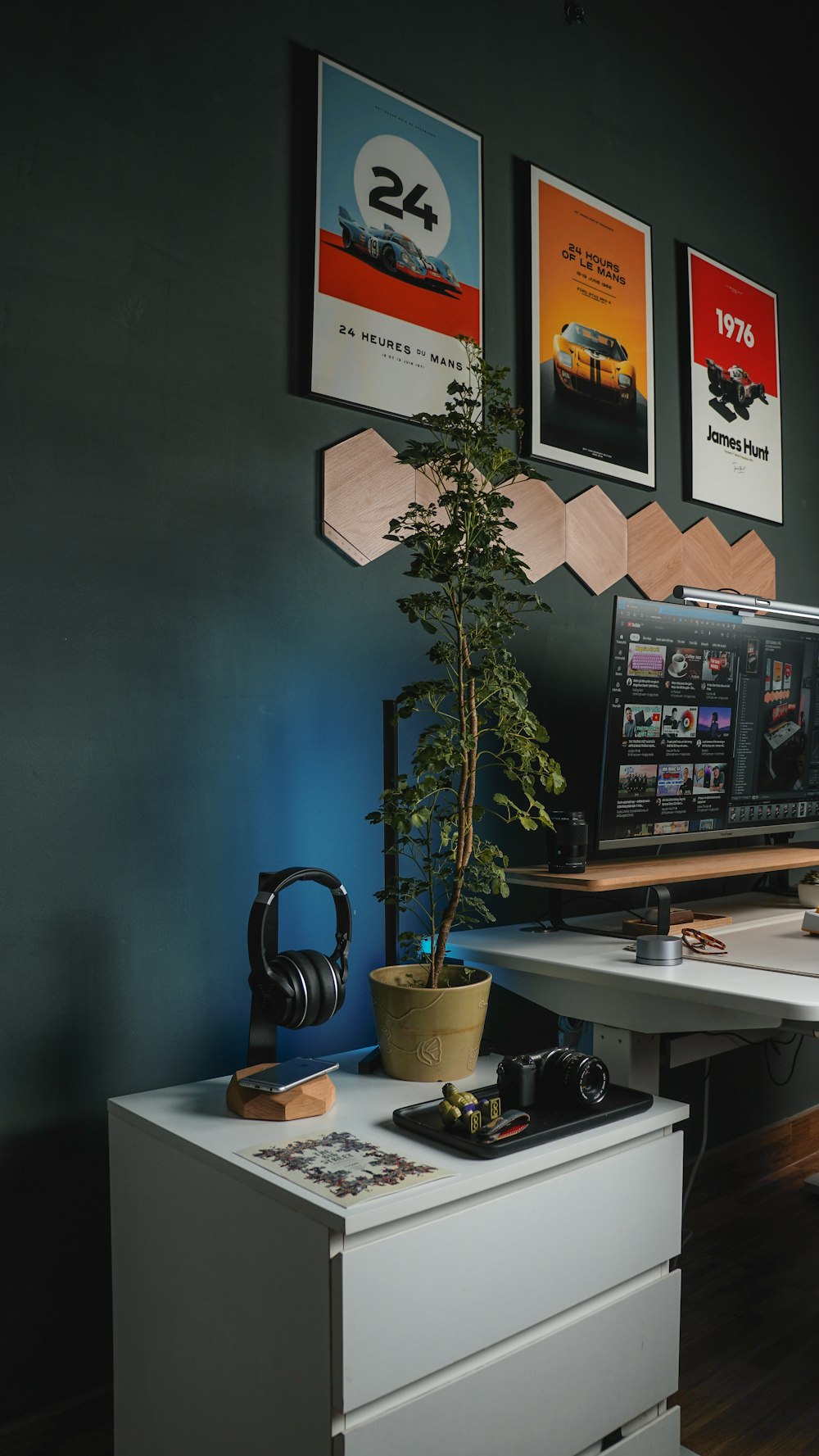 a desk with a plant on it