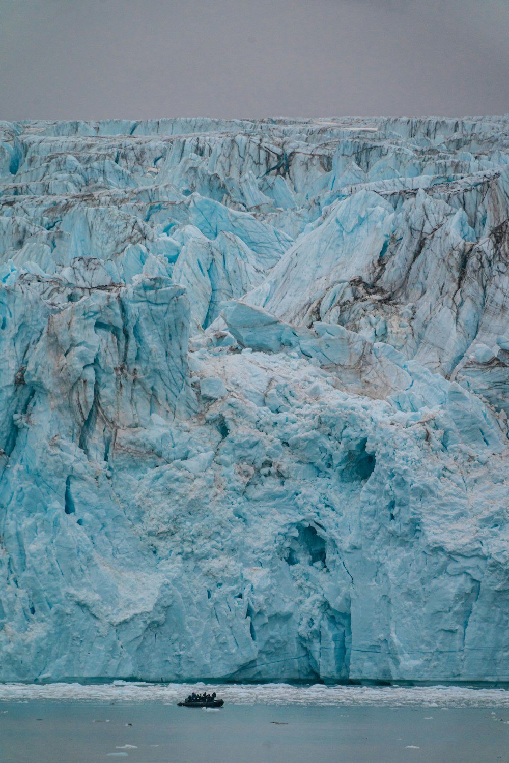 a large iceberg in the water