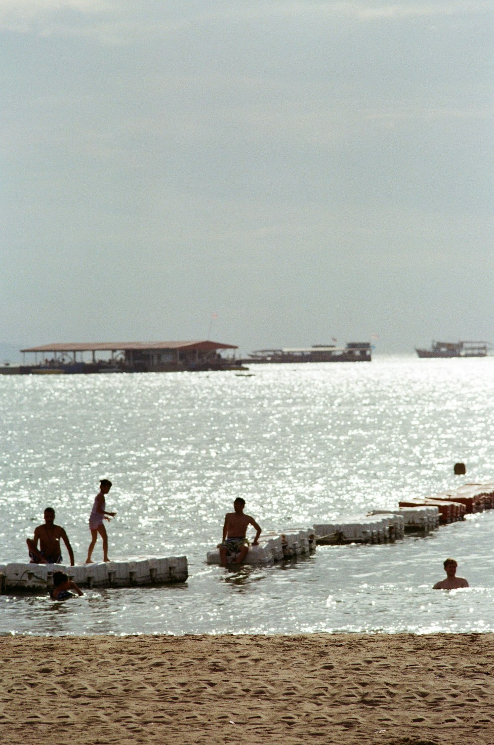 people sitting on a dock