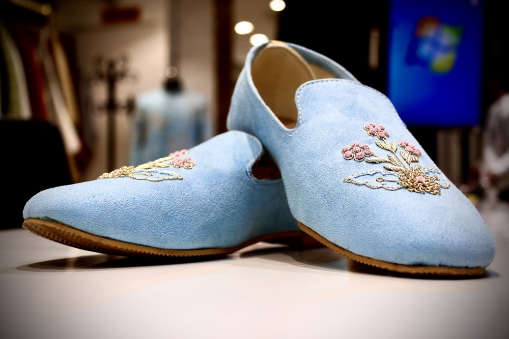 a pair of blue shoes