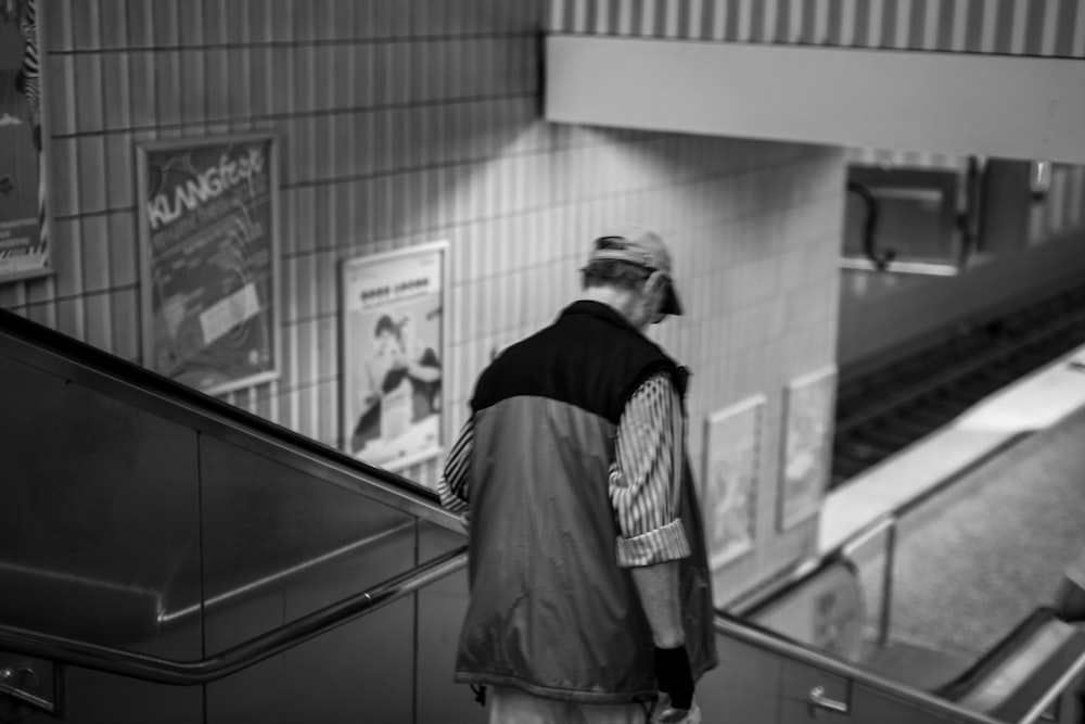 a man standing in a bowling alley