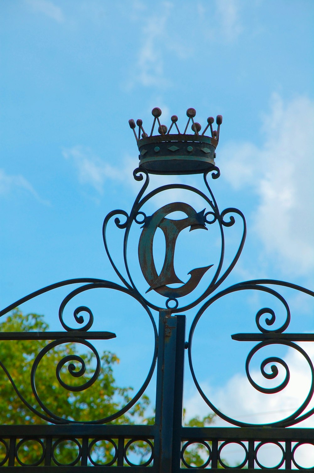 a metal gate with a metal railing